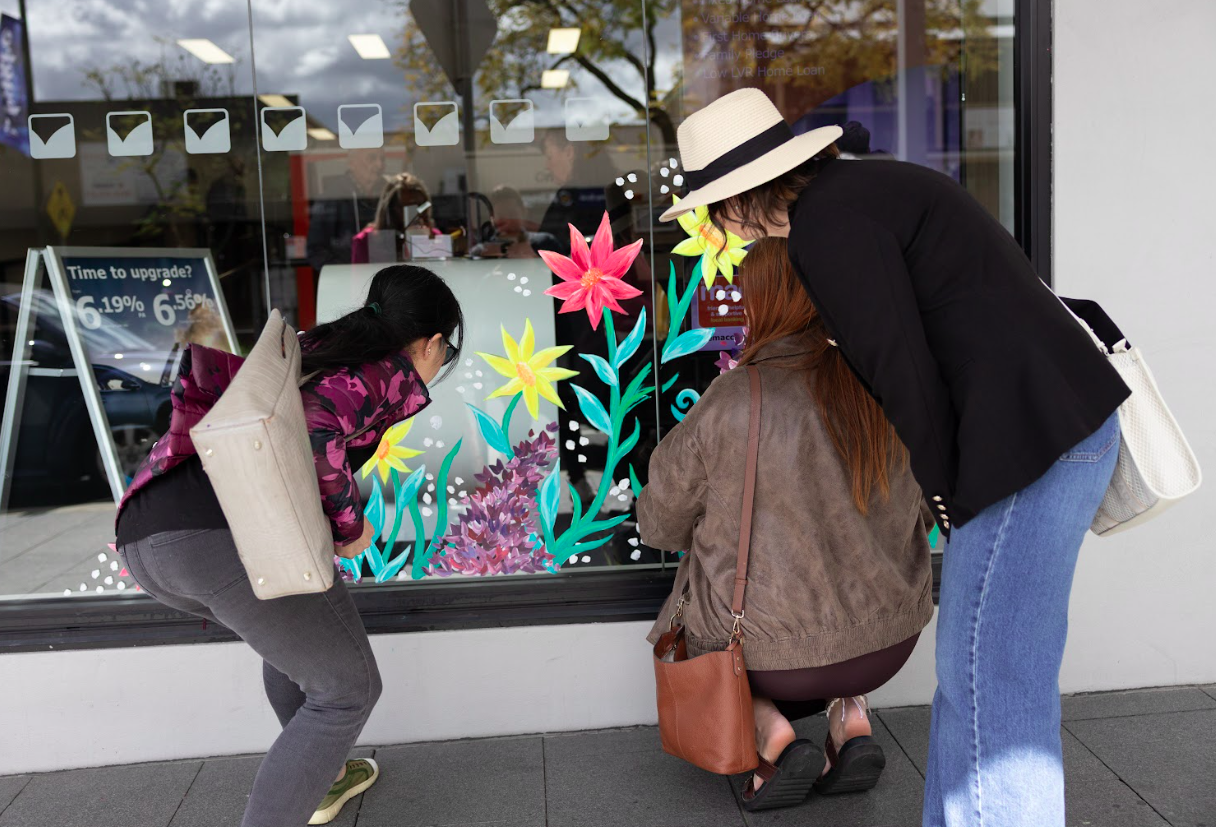 2025 Spring into Camden Village window painting project